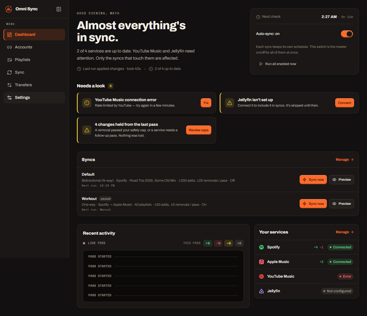 Omni Playlist Sync dashboard showing sync status, configured sync jobs, a live activity feed, and connected Spotify, Apple Music, YouTube Music, and Jellyfin services